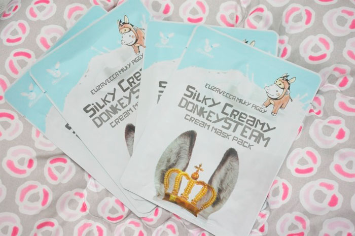 Осветляющая тканевая маска с кремовой пропиткой на основе ослиного молока Elizavecca Silky Creamy Donkey Steam Cream Mask Pack фото 1 / Sweetness